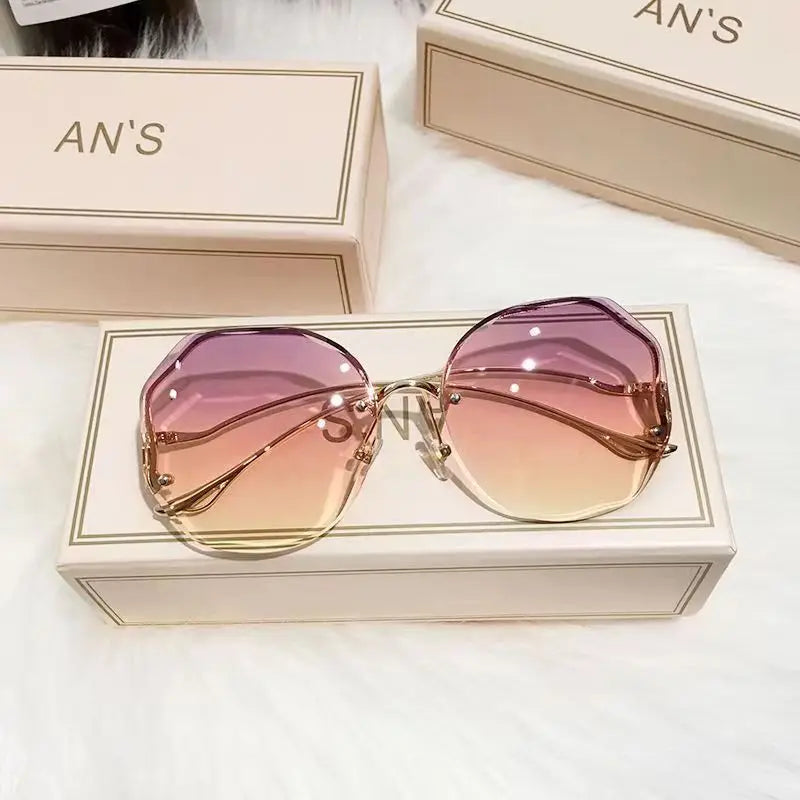 Ladies Frameless Curved Rim Sunglasses - various colours