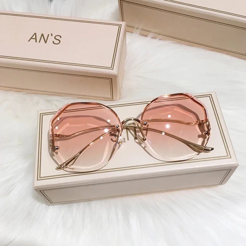 Ladies Frameless Curved Rim Sunglasses - various colours
