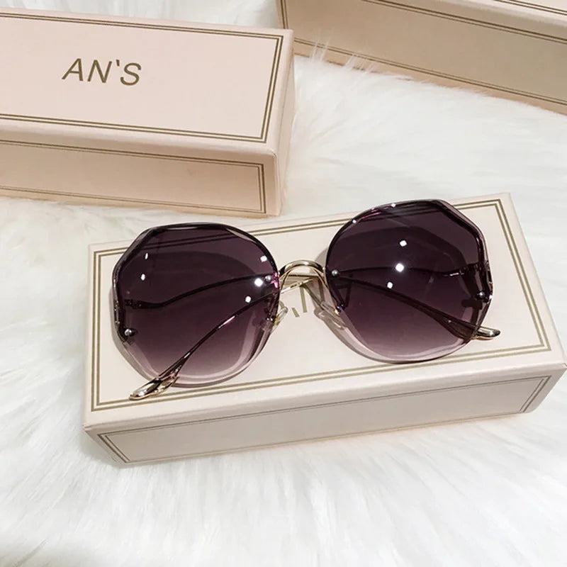Ladies Frameless Curved Rim Sunglasses - various colours