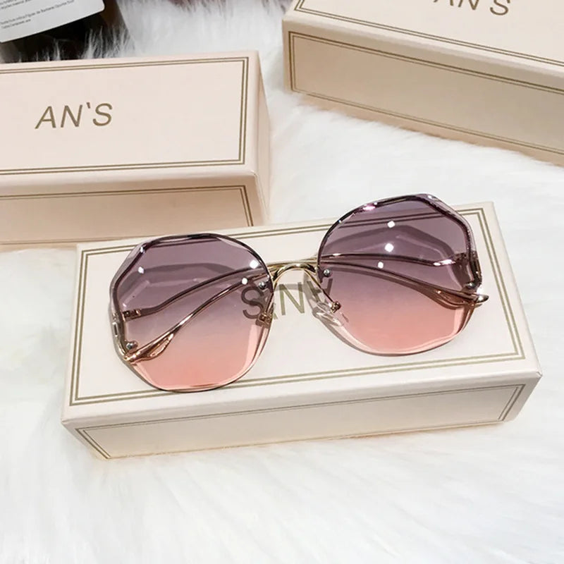 Ladies Frameless Curved Rim Sunglasses - various colours
