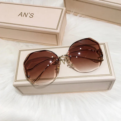 Ladies Frameless Curved Rim Sunglasses - various colours