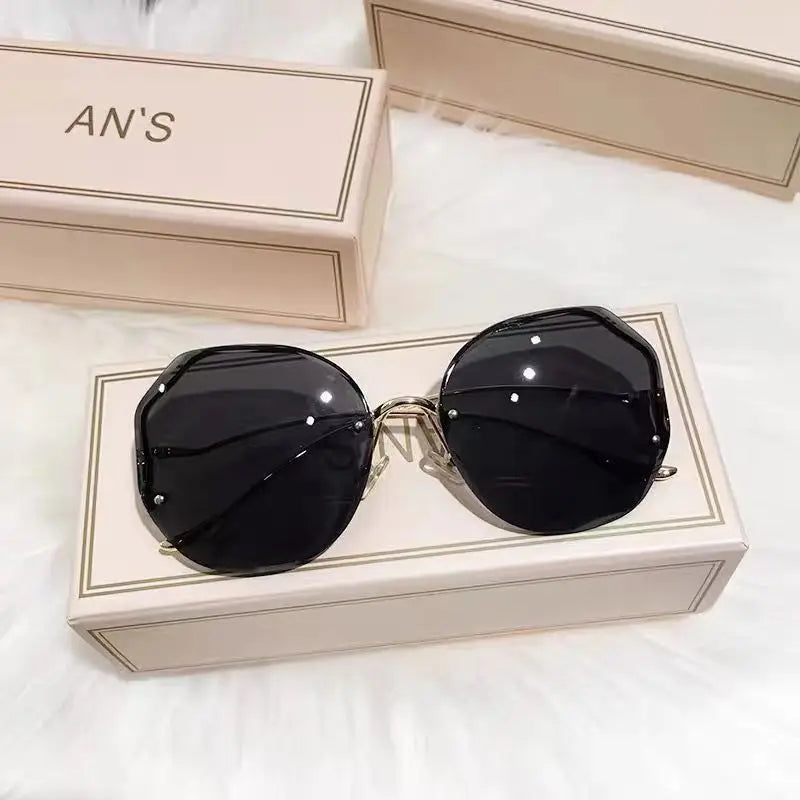 Ladies Frameless Curved Rim Sunglasses - various colours