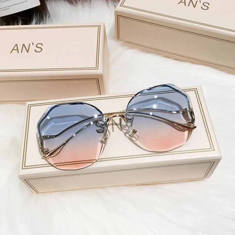 Ladies Frameless Curved Rim Sunglasses - various colours