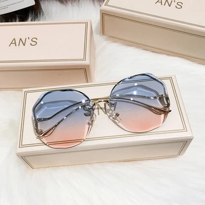 Ladies Frameless Curved Rim Sunglasses - various colours